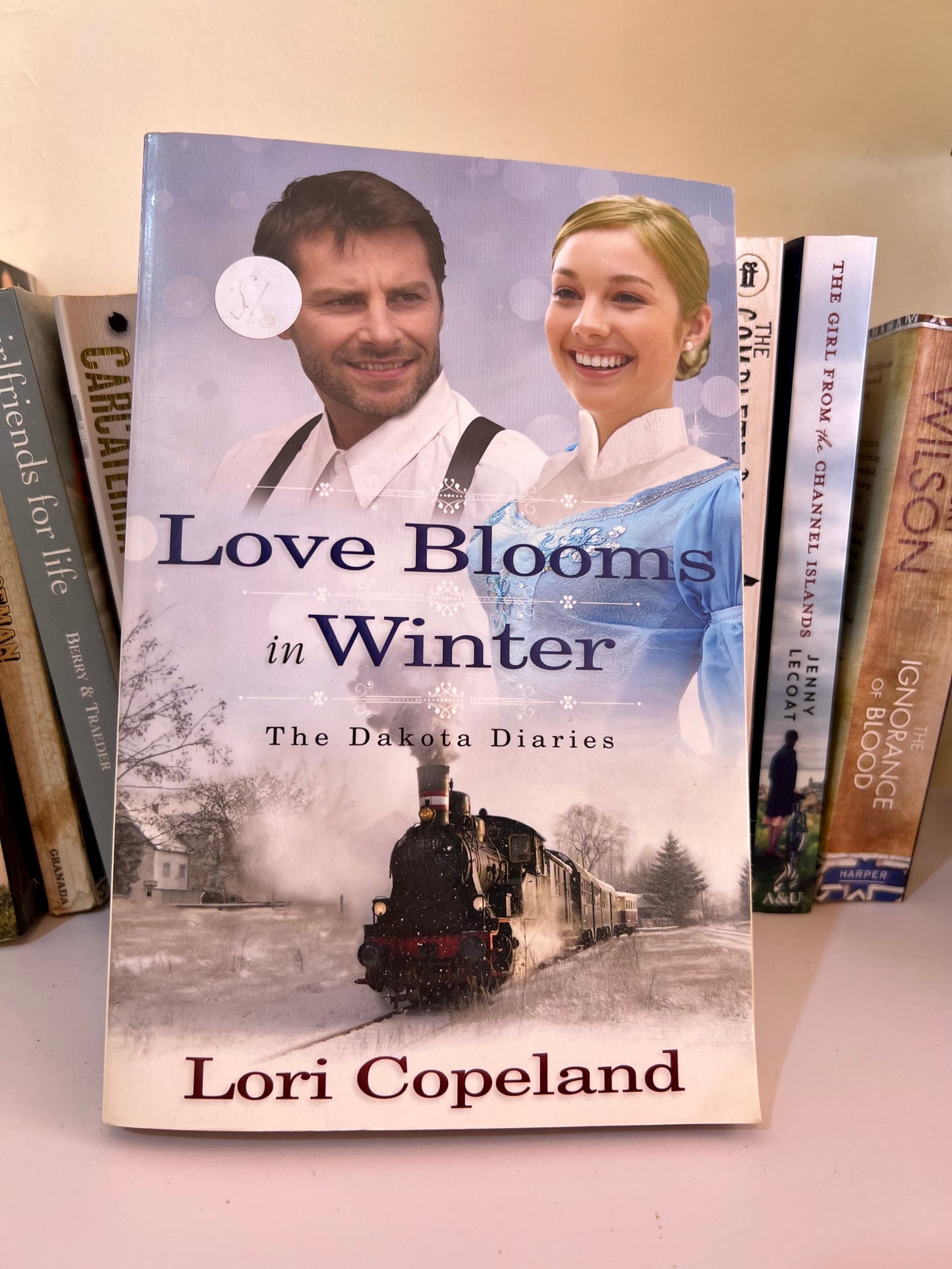 BOOK- LOVE BLOOMS IN WINTER